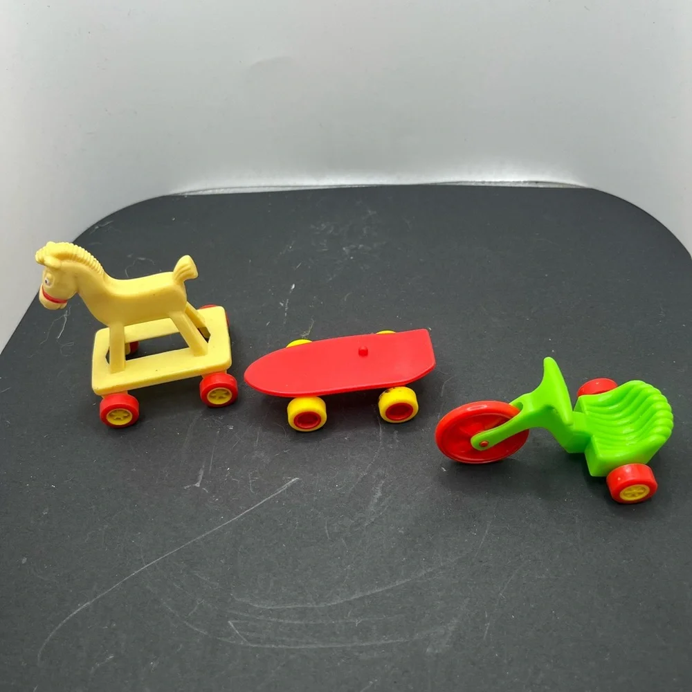 Colorful Kids Toy Set with Horse, Skateboard, and Tricycle